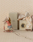 Stuffed mouse toy of a sister mouse on a scooter and a mum mouse with standing by in the laundry room -Sister Mouse - Big Sister