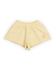 TNS Logo Short | Soft Lemon